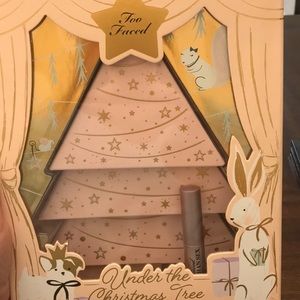 Too faced under the Christmas tree